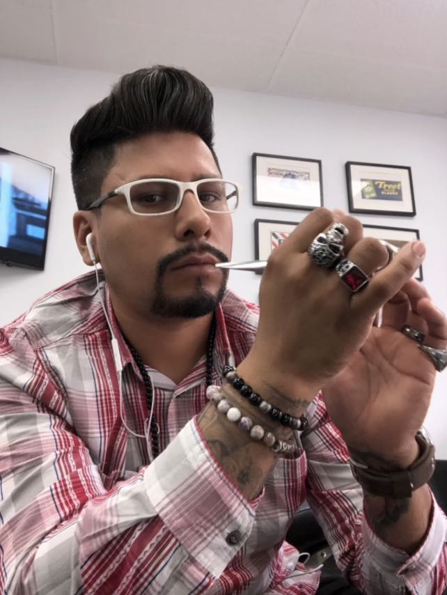 The Barber Abraham at 360 Degree Barbershop